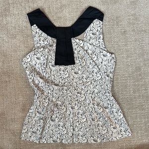 Anthropologie structured floral cotton peplum tank top